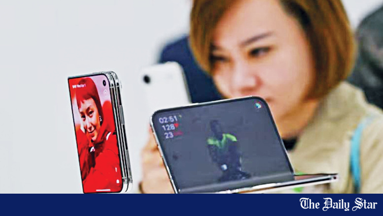 Apple's first foldable smartphone, the iPhone Duo, displayed in a store