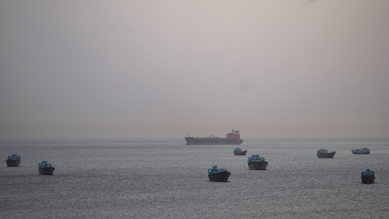 Red Sea shipping lane with oil tankers and cargo vessels navigating through Bab el-Mandeb strait after Houthi attack on Saudi Aramco facilities